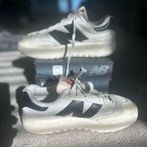 New Balance Cream and Black Sneakers